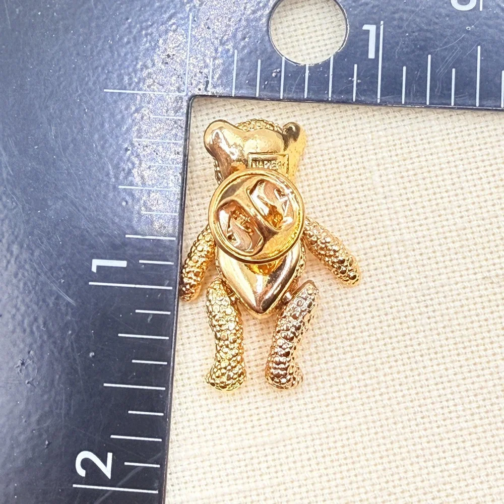 Vintage NAPIER Gold Tone Articulated Teddy Bear Pin Clear Brown Rhinestone Belly